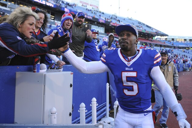 Buffalo Bills fans cheer for quarterback Tyrod Taylor (5) after an NFL football game against the Miami Dolphins Sunday, Nov. 8, 2015, in Orchard Park, N.Y. The Bills won the game 33-17. (AP Photo/Gary Wiepert)