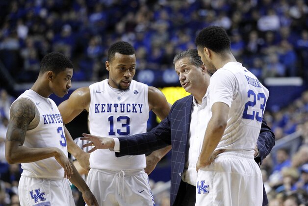 Nov 6, 2015; Lexington, KY, USA; Kentucky Wildcats head coach John Calipari talks with guard Tyler Ulis (3), guard Isaiah Briscoe (13) and guard Jamal Murray (23) during the game against the Kentucky State Thorobreds in the second half at Rupp Arena. Kentucky defeated Kentucky State 111-58. Mandatory Credit: Mark Zerof-USA TODAY Sports