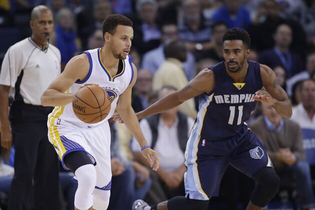 Golden State Warriors' Stephen Curry, left, dribbles next to Memphis Grizzlies' Mike Conley (11) during an NBA basketball game Monday, Nov. 2, 2015, in Oakland, Calif. (AP Photo/Marcio Jose Sanchez)