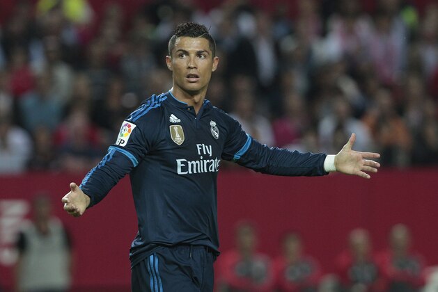 Real Madrid's Cristiano Ronaldo gestures during their La Liga soccer match against Sevilla at the Ramon Sanchez Pizjuan stadium, in Seville, Spain on Sunday, Nov. 8, 2015. (AP Photo/Angel Fernandez)