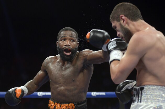 CINCINNATI, OHIO - OCTOBER 03: Adrien Broner, left, takes a swing at Khabib Allakhverdiev during a fight at U.S. Bank Arena on October 4, 2015 in Cincinnati, Ohio. (Photo by Dylan Buell/Getty Images)