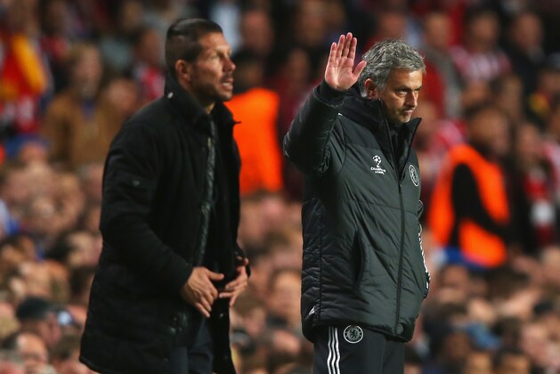 LONDON, ENGLAND - APRIL 30:  Jose Mourinho, manager of Chelsea acknowledges the crowd with Diego Simeone, coach of Club Atletico de Madrid during the UEFA Champions League semi-final second leg match between Chelsea and Club Atletico de Madrid at Stamford Bridge on April 30, 2014 in London, England.  (Photo by Clive Rose/Getty Images)