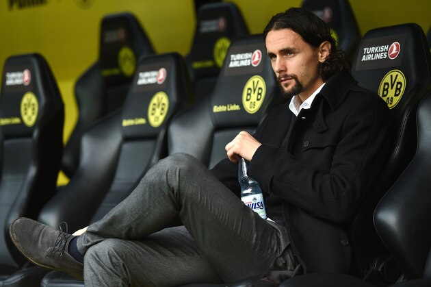 Dortmund's Serbian defender Neven Subotic looks on prior to the German first division football Bundesliga match Borussia Dortmund vs FC Schalke 04 on November 8, 2015, 2015 in Dortmund, western Germany. 
AFP PHOTO / PATRIK STOLLARZ

RESTRICTIONS: DURING MATCH TIME: DFL RULES TO LIMIT THE ONLINE USAGE TO 15 PICTURES PER MATCH AND FORBID IMAGE SEQUENCES TO SIMULATE VIDEO. 
==RESTRICTED TO EDITORIAL USE ==
FOR FURTHER QUERIES PLEASE CONTACT THE DFL DIRECTLY AT + 49 69 650050.        (Photo credit should read PATRIK STOLLARZ/AFP/Getty Images)