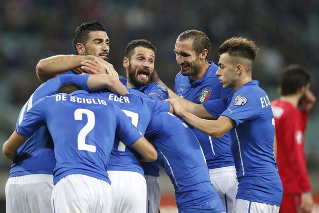 Italy's players  celebrate after scoring third goal during the Euro 2016 group H qualifying soccer match between the Azerbaijan and Italy at the Olympic stadium in Baku, Azerbaijan, Saturday, Oct. 10, 2015. (AP Photo/Mindaugas Kulbis)