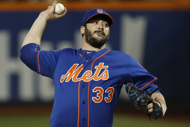 New York Mets pitcher Matt Harvey pitches during the first inning of Game 5 of the Major League Baseball World Series against the Kansas City Royals Sunday, Nov. 1, 2015, in New York. (AP Photo/Matt Slocum)