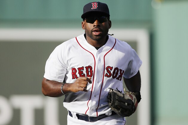 Boston Red Sox's Jackie Bradley Jr. comes in during the third inning of a baseball game against the Baltimore Orioles in Boston, Saturday, Sept. 26, 2015. (AP Photo/Michael Dwyer)