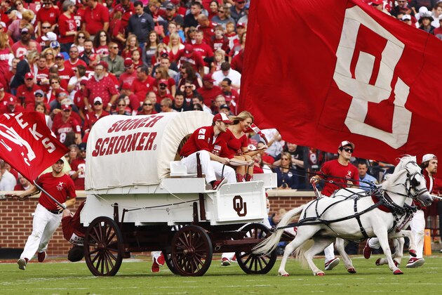 The Oklahoma Sooner Schooner and Ruf Neks before the start of an NCAA college football game in Norman, Okla., Saturday, Sept. 19, 2015. (AP Photo/Alonzo Adams)