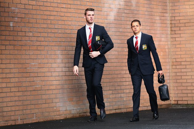 BURNLEY, ENGLAND - AUGUST 30:  David De Gea and Javier Hernandez of Manchester United arrives prior to the Barclays Premier League match between Burnley and Manchester United at Turf Moor on August 30, 2014 in Burnley, England.  (Photo by Clive Brunskill/Getty Images)