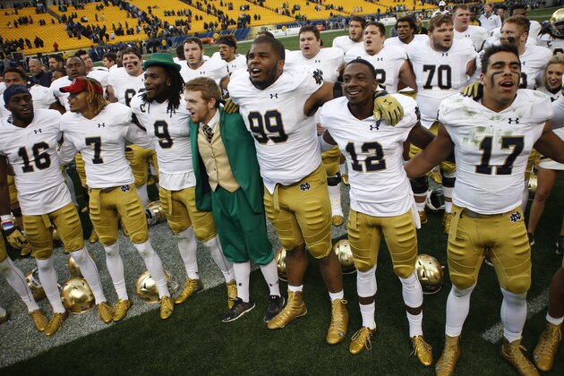 Members of the Notre Dame football team sing their Alma Mater after defeating Pittsburgh in an NCAA football game, Saturday, Nov. 7, 2015 in Pittsburgh. Notre Dame won 42-30. (AP Photo/Keith Srakocic)