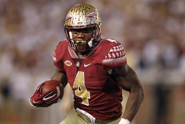 Oct 24, 2015; Atlanta, GA, USA; Florida State Seminoles running back Dalvin Cook (4) runs the ball against the Georgia Tech Yellow Jackets in the fourth quarter at Bobby Dodd Stadium. Georgia Tech defeated Florida State 22-16. Mandatory Credit: Brett Davis-USA TODAY Sports