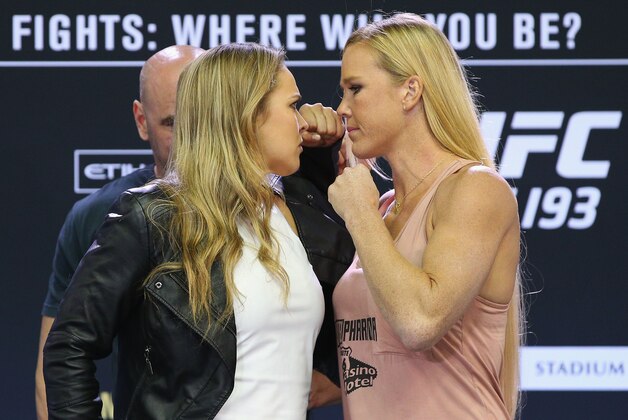 MELBOURNE, AUSTRALIA - SEPTEMBER 16: UFC Women's Bantamweight Champion Ronda Rousey (L) faces off against Holly Holm during the UFC 193 media event at Etihad Stadium on September 16, 2015 in Melbourne, Australia. (Photo by Michael Dodge/Zuffa LLC/Zuffa LLC via Getty Images) MELBOURNE, AUSTRALIA - SEPTEMBER 16: UFC Women's Bantamweight Champion Ronda Rousey (L) faces off against Holly Holm during the UFC 193 media event at Etihad Stadium on September 16, 2015 in Melbourne, Australia. (Photo by Michael Dodge/Zuffa LLC/Zuffa LLC via Getty Images)