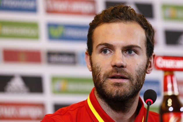 CORRECTION PLAYERS' NAME IN CAPTION
Spain's midfielder Juan Mata speaks during a press conference at the hotel Melia in Alicante on November 12, 2015 on the eve of the friendly football match Spain vs England.   AFP PHOTO/ MANUEL LORENZO        (Photo credit should read MANUEL LORENZO/AFP/Getty Images)