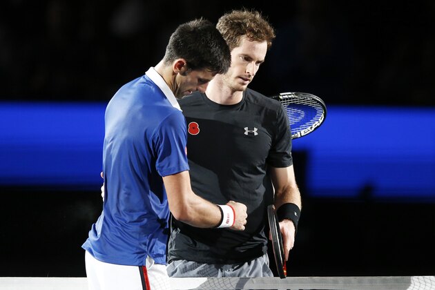 Serbia's Novak Djokovic shakes hands with Britain's Andy Murray after winning their final match of the BNP Masters tennis tournament at the Paris Bercy Arena in Paris, France, Sunday, Nov. 8, 2015. Djokovic wins with 6-2, 6-4. (AP Photo/Francois Mori)