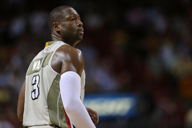 MIAMI, FL - NOVEMBER 10: Dwyane Wade #3 of the Miami Heat looks on during a game against the Los Angeles Lakers at American Airlines Arena on November 10, 2015 in Miami, Florida. NOTE TO USER: User expressly acknowledges and agrees that, by downloading and/or using this photograph, user is consenting to the terms and conditions of the Getty Images License Agreement. Mandatory copyright notice:  (Photo by Mike Ehrmann/Getty Images)