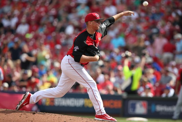 United States' Sean Newcomb throws during the seventh inning of the All-Star Futures baseball game against Team World, Sunday, July 12, 2015, in Cincinnati. (AP Photo/John Minchillo)