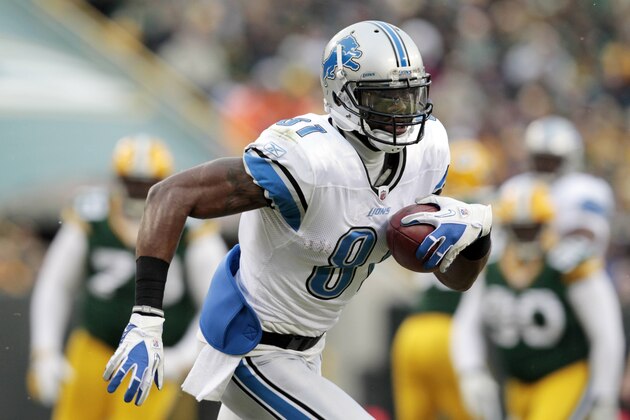 FILE - In this Jan. 1, 2012, file photo, Detroit Lions' Calvin Johnson runs upfield during the first half of an NFL football game against the Green Bay Packers in Green Bay, Wis. Johnson and Minnesota Vikings defensive end Jared Allen are the leading vote getters for The Associated Press 2011 NFL All-Pro Team announced Friday, Jan. 6, 2012, each falling one vote short of being unanimous choices. (AP Photo/Mike Roemer, File)