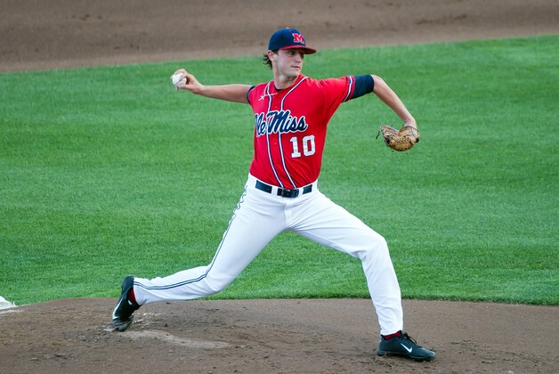 Jun 15, 2014; Omaha, NE, USA; Mississippi Rebels pitcher Chris Ellis (10) pitches against the Virginia Cavaliers during game four of the 2014 College World Series at TD Ameritrade Park Omaha. Mandatory Credit: Steven Branscombe-USA TODAY Sports