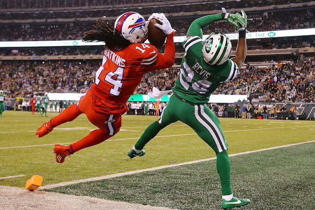 EAST RUTHERFORD, NJ - NOVEMBER 12:  Sammy Watkins #14 of the Buffalo Bills attempts to catch a pass in the end zone under pressure from Darrelle Revis #24 of the New York Jets during the second quarter at MetLife Stadium on November 12, 2015 in East Rutherford, New Jersey.  (Photo by Al Bello/Getty Images)