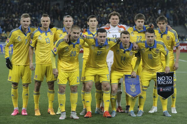 Ukrainian soccer team pose for photo prior the Euro 2016 qualifying soccer match in Group C between Spain and Ukraine at the Olympiyskiy national stadium in Kiev, Ukraine,  Monday, Oct. 12, 2015. (AP Photo/Efrem Lukatsky)