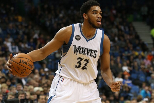 MINNEAPOLIS, MN -  NOVEMBER 12:  Karl-Anthony Towns #32 of the Minnesota Timberwolves handles the ball against the Golden State Warriors on November 12, 2015 at Target Center in Minneapolis, Minnesota. NOTE TO USER: User expressly acknowledges and agrees that, by downloading and or using this Photograph, user is consenting to the terms and conditions of the Getty Images License Agreement. Mandatory Copyright Notice: Copyright 2015 NBAE (Photo by Jordan Johnson/NBAE via Getty Images)