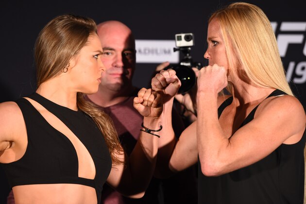 MELBOURNE, AUSTRALIA - NOVEMBER 13:  (L-R) Opponents Ronda Rousey of the United States and Holly Holm of the United States face off during the UFC 193 Ultimate Media Day festivities at Etihad Stadium on November 13, 2015 in Melbourne, Australia. (Photo by Josh Hedges/Zuffa LLC/Zuffa LLC via Getty Images)