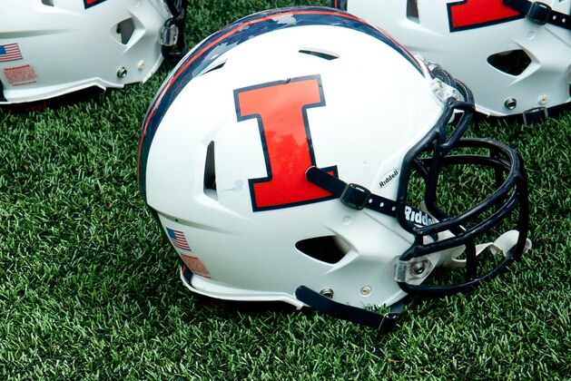 An Illinois Fighting Illini football helmet during an NCAA college football game, Saturday, Aug. 30, 2014 at Memorial Stadium in Champaign, Ill. (AP Photo/Bradley Leeb)