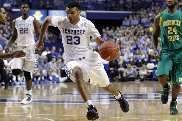 Nov 6, 2015; Lexington, KY, USA; Kentucky Wildcats guard Jamal Murray (23) dribbles the ball against Kentucky State Thorobreds forward Ivan Hooker (24) in the second half at Rupp Arena. Kentucky defeated Kentucky State 111-58. Mandatory Credit: Mark Zerof-USA TODAY Sports