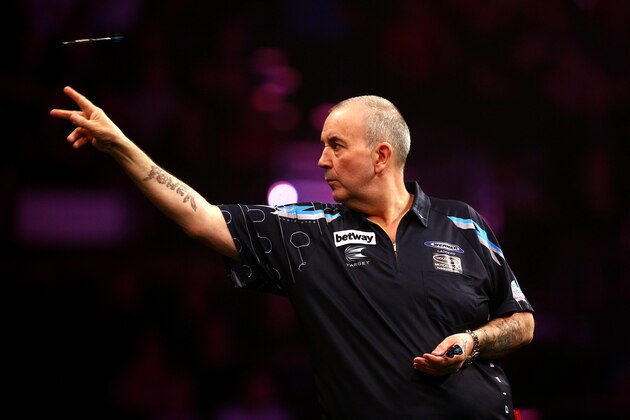 BRIGHTON, ENGLAND - MAY 14: Phil Taylor of England in action during his match against James Wade of England during the Betway Premier League at The Brighton Centre on May 14, 2015 in Brighton, England. (Photo by Charlie Crowhurst/Getty Images)