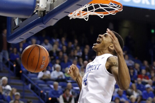 Kentucky's Charles Matthews reacts to his dunk during an NCAA college basketball game against Albany, Friday, Nov. 13, 2015, in Lexington, Ky. (AP Photo/James Crisp)