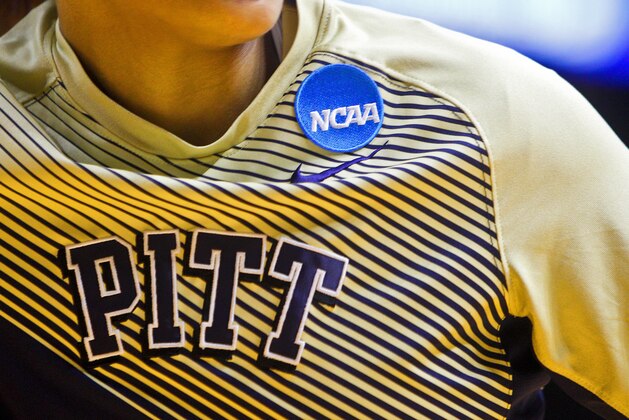 The NCAA logo is shown on a Pittsburgh players warmup jersey before a NCAA women's college basketball tournament game against Chattanooga Saturday, March 21, 2015, in Knoxville, Tenn. (AP Photo/Wade Payne)