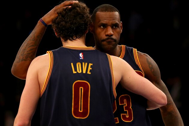 NEW YORK, NY - NOVEMBER 13:  LeBron James #23 and Kevin Love #0 of the Cleveland Cavaliers celebrate the win over the New York Knicks at Madison Square Garden on November 13, 2015 in New York City.NOTE TO USER: User expressly acknowledges and agrees that, by downloading and/or using this photograph, user is consenting to the terms and conditions of the Getty Images License Agreement.The Cleveland Cavaliers defeated the New York Knicks 90-84.  (Photo by Elsa/Getty Images)
