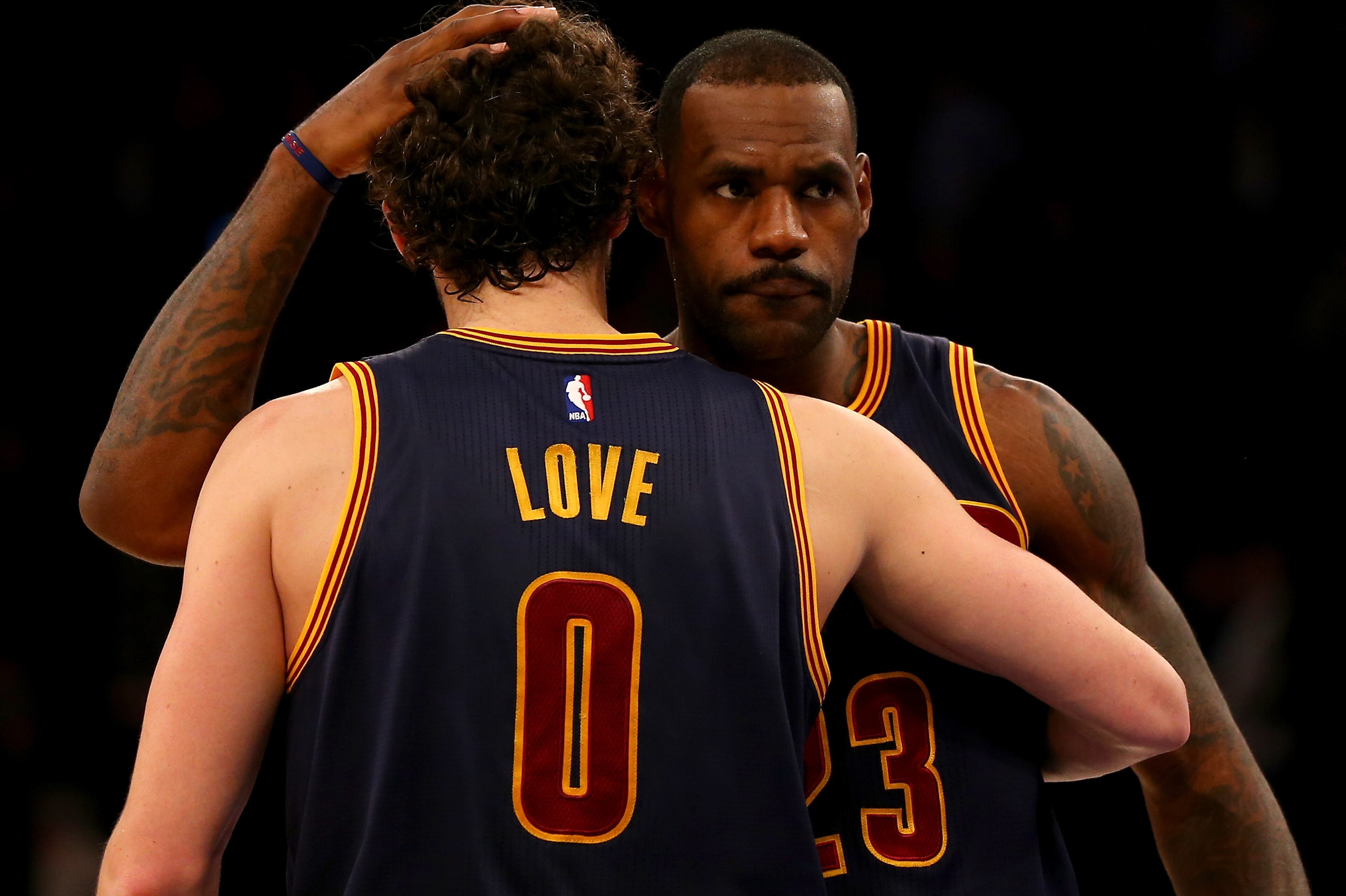 NEW YORK, NY - NOVEMBER 13:  LeBron James #23 and Kevin Love #0 of the Cleveland Cavaliers celebrate the win over the New York Knicks at Madison Square Garden on November 13, 2015 in New York City.NOTE TO USER: User expressly acknowledges and agrees that, by downloading and/or using this photograph, user is consenting to the terms and conditions of the Getty Images License Agreement.The Cleveland Cavaliers defeated the New York Knicks 90-84.  (Photo by Elsa/Getty Images)