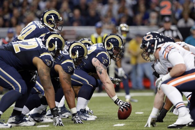 Members of the St. Louis Rams and Chicago Bears on the line of scrimmage during the fourth quarter of an NFL football game on Sunday, Nov. 24, 2013, in St. Louis. The Rams won 42-21. (AP Photo/Nam Y. Huh)