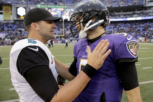 Jacksonville Jaguars quarterback Blake Bortles (5) greats Baltimore Ravens quarterback Joe Flacco (5) after an NFL football game in Baltimore, Sunday, Dec. 14, 2014. The Ravens defeated the Jaguars 20-12. (AP Photo/Patrick Semansky)