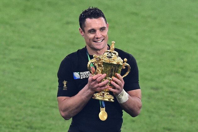 New Zealand's fly half Dan Carter  holds the Webb Ellis Cup as he celebrates  winning the final match of the 2015 Rugby World Cup between New Zealand and Australia at Twickenham stadium, south west London, on October 31, 2015. AFP PHOTO / GABRIEL BOUYS

RESTRICTED TO EDITORIAL USE, NO USE IN LIVE MATCH TRACKING SERVICES, TO BE USED AS NON-SEQUENTIAL STILLS        (Photo credit should read GABRIEL BOUYS/AFP/Getty Images)