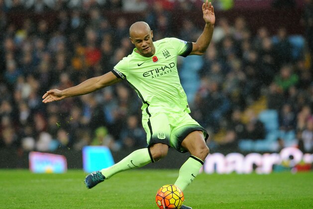 Manchester City captain Vincent Kompany controls the ball during the English Premier League soccer match between Aston Villa and Manchester City at the Villa Park, Birmingham, England, Sunday, Nov. 8, 2015. (AP Photo/Rui Vieira)