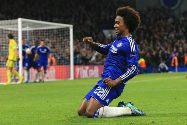 Chelsea's Willian celebrates after scoring the winning goal during the Champions League Group G soccer match between Chelsea and Dynamo Kiev at Stamford Bridge Stadium in London,  Wednesday, Nov. 4, 2015. (AP Photo/Tim Ireland)