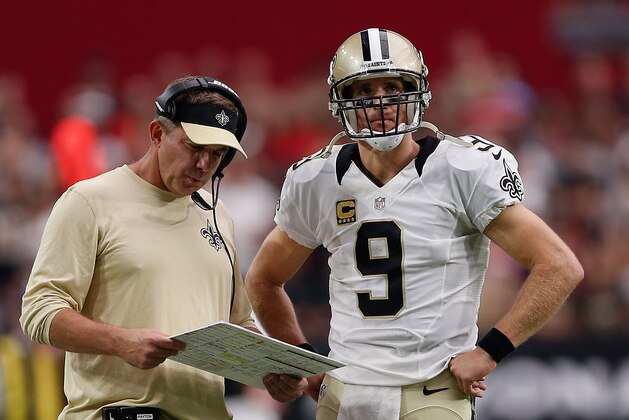 GLENDALE, AZ - SEPTEMBER 13:  Head coach Sean Payton of the New Orleans Saints (left) talks with quarterback Drew Brees #9 during the second half of the NFL game against the Arizona Cardinals at the University of Phoenix Stadium on September 13, 2015 in Glendale, Arizona.  The Cardinals defeated the Saints 31-19.  (Photo by Christian Petersen/Getty Images)