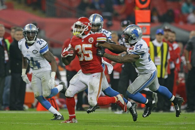 Kansas City Chiefs running back Charcandrick West (35) runs with the ball during the NFL football game between Detroit Lions and Kansas City Chiefs Wembley Stadium in London,  Sunday, Nov. 1, 2015. (AP Photo/Matt Dunham)