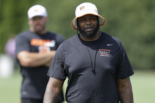 Cincinnati Bengals offensive tackle Andre Smith participates in NFL football training camp, Tuesday, Aug. 4, 2015, in Cincinnati. (AP Photo/John Minchillo)