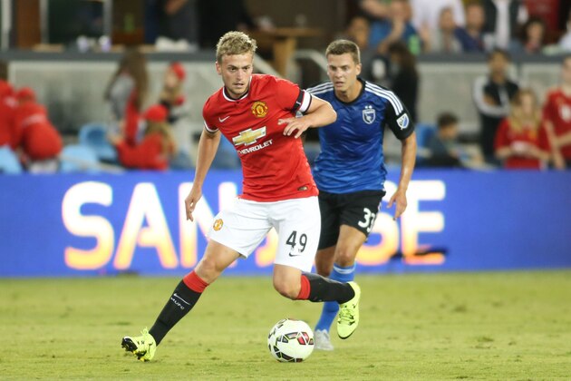 James Wilson of Manchester United navigates the defense at Avaya Stadium in the second half of the International Champions Cup North America between the San Jose Earthquakes and visiting Manchester United, on Tuesday, July 21, 2015, in San Jose, California. Manchester United lead 3-1 at the 77th minute. (Tomas Ovalle/AP Images for International Champions Cup)