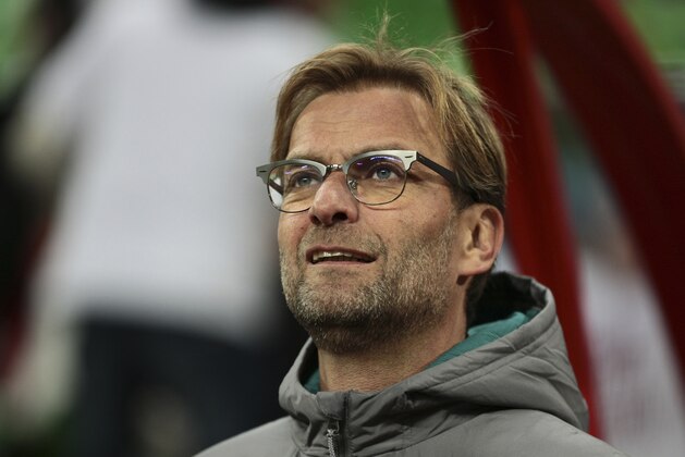 Liverpool’s coach Jurgen Klopp watches  a Europa League Group B soccer match between Rubin and Liverpool in Kazan, Russia, Thursday, Nov. 5, 2015. (AP Photo/Nikolai Alexandrov)