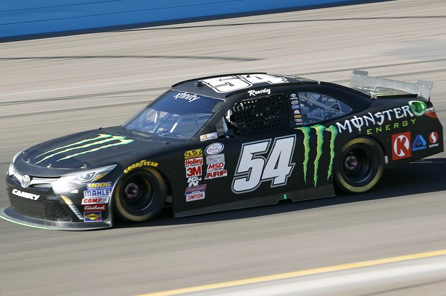 Kyle Busch drives into Turn 2 during qualifying for the NASCAR Xfinity Series auto race at Phoenix International Raceway, Saturday, Nov. 14, 2015 in Avondale, Ariz. Busch won the pole position for the race with a lap time of 25.992 seconds. (AP Photo/Ralph Freso)