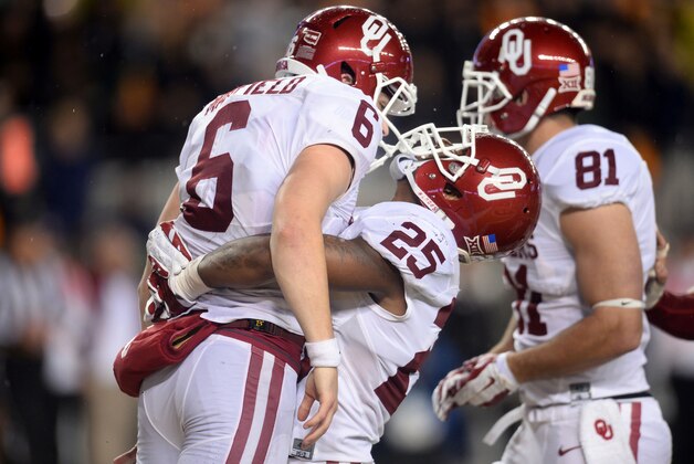 Nov 14, 2015; Waco, TX, USA; Oklahoma Sooners quarterback Baker Mayfield (6) celebrates a touchdown against the Baylor Bears during the first half at McLane Stadium. Mandatory Credit: Joe Camporeale-USA TODAY Sports