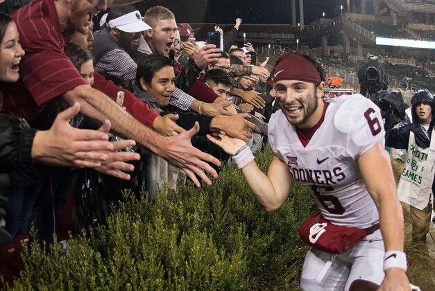 Nov 14, 2015; Waco, TX, USA; Oklahoma Sooners quarterback Baker Mayfield (6) celebrates with the Sooner fans after the win over the Baylor Bears at McLane Stadium. The Sooners defeat the Bears 44-34. Mandatory Credit: Jerome Miron-USA TODAY Sports
