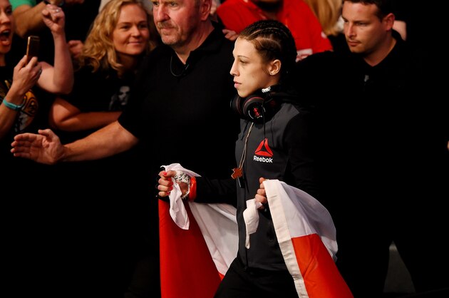 MELBOURNE, AUSTRALIA - NOVEMBER 15: Joanna Jedrzejczyk walks to the Octagon before facing Valerie Letourneau (not pictured) in their UFC women's strawweight championship bout during the UFC 193 event at Etihad Stadium on November 15, 2015 in Melbourne, Australia.  (Photo by Josh Hedges/Zuffa LLC/Zuffa LLC via Getty Images)