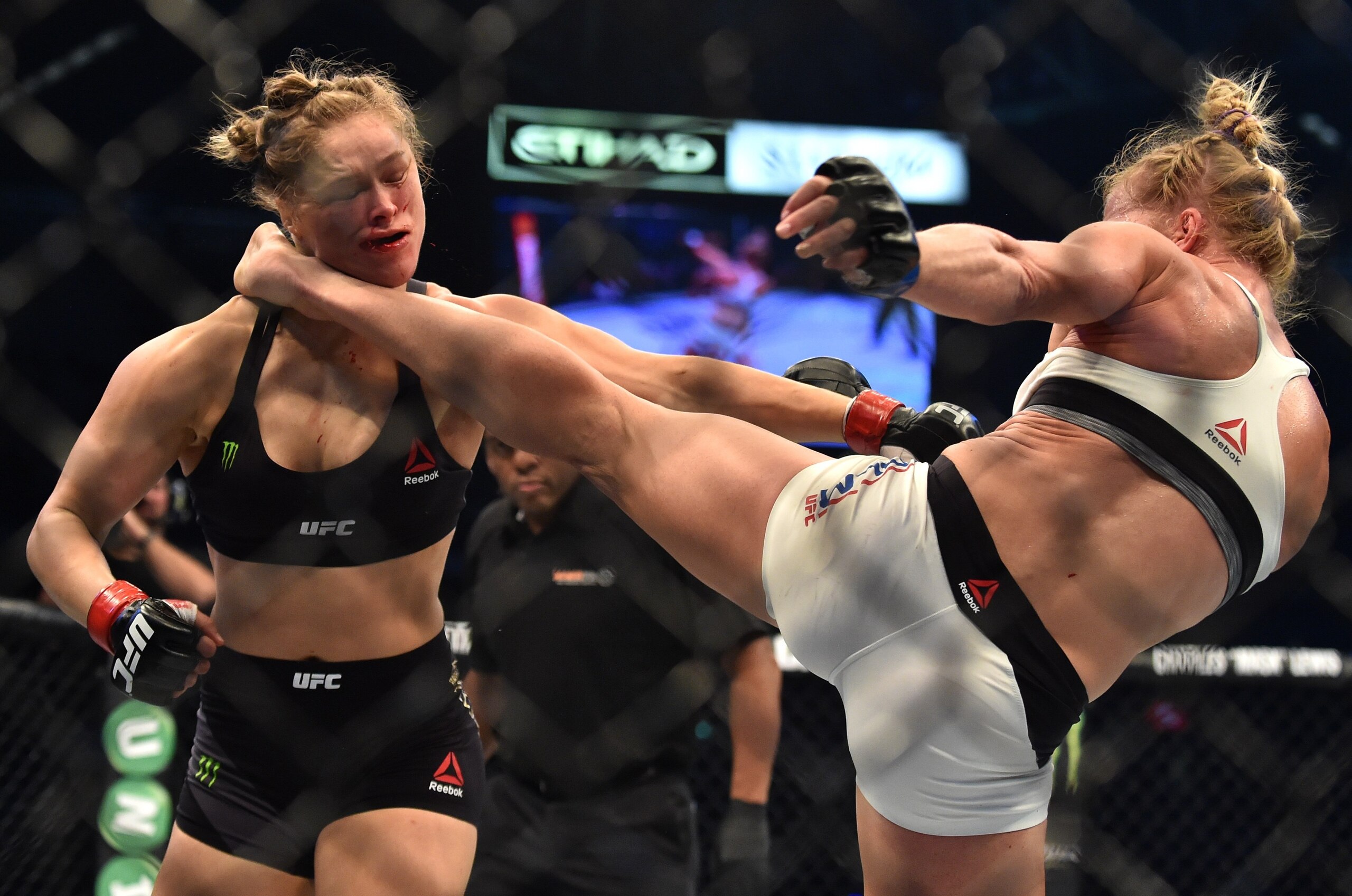 Holly Holm of the US (R) lands a kick to the neck to knock out compatriot Ronda Rousey and win the UFC title fight in Melbourne on November 15, 2015. RESTRICTED TO EDITORIAL USE NO ADVERTISING USE NO PROMOTIONAL USE NO MERCHANDISING USE. AFP PHOTO/Paul CROCK (Photo credit should read PAUL CROCK/AFP/Getty Images) Holly Holm of the US (R) lands a kick to the neck to knock out compatriot Ronda Rousey and win the UFC title fight in Melbourne on November 15, 2015. RESTRICTED TO EDITORIAL USE NO ADVERTISING USE NO PROMOTIONAL USE NO MERCHANDISING USE. AFP PHOTO/Paul CROCK (Photo credit should read PAUL CROCK/AFP/Getty Images)