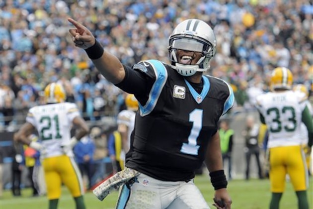 FILE - In this Nov. 8, 2015, file photo, Carolina Panthers quarterback Cam Newton (1) celebrates his touchdown pass against the Green Bay Packers during an NFL football game in Charlotte, N.C. The Panthers are one of three unbeaten teams heading into the second half of the season. (AP Photo/Mike McCarn, File)