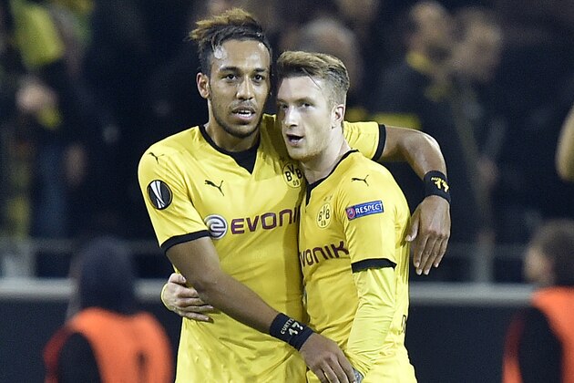 Dortmund's second scorer Pierre-Emerick Aubameyang, left, celebrates his goal with first scorer  Marco Reus, right, during the Europa League group C soccer match between Borussia Dortmund and Qabala FC in Dortmund, Germany, Thursday, Nov. 5, 2015. (AP Photo/Martin Meissner)
