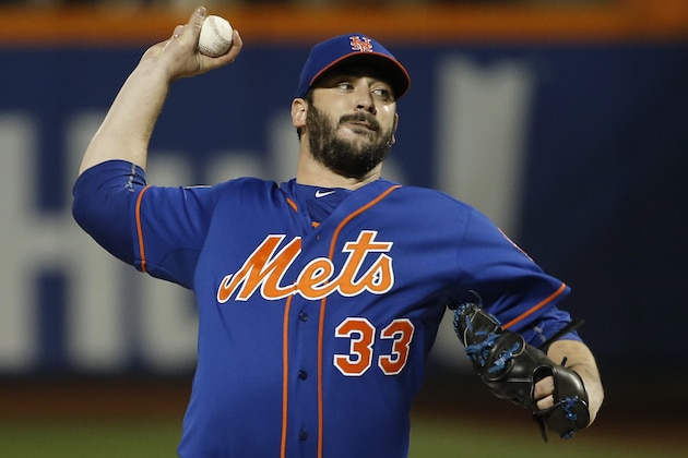 New York Mets pitcher Matt Harvey pitches during the first inning of Game 5 of the Major League Baseball World Series against the Kansas City Royals Sunday, Nov. 1, 2015, in New York. (AP Photo/Matt Slocum)